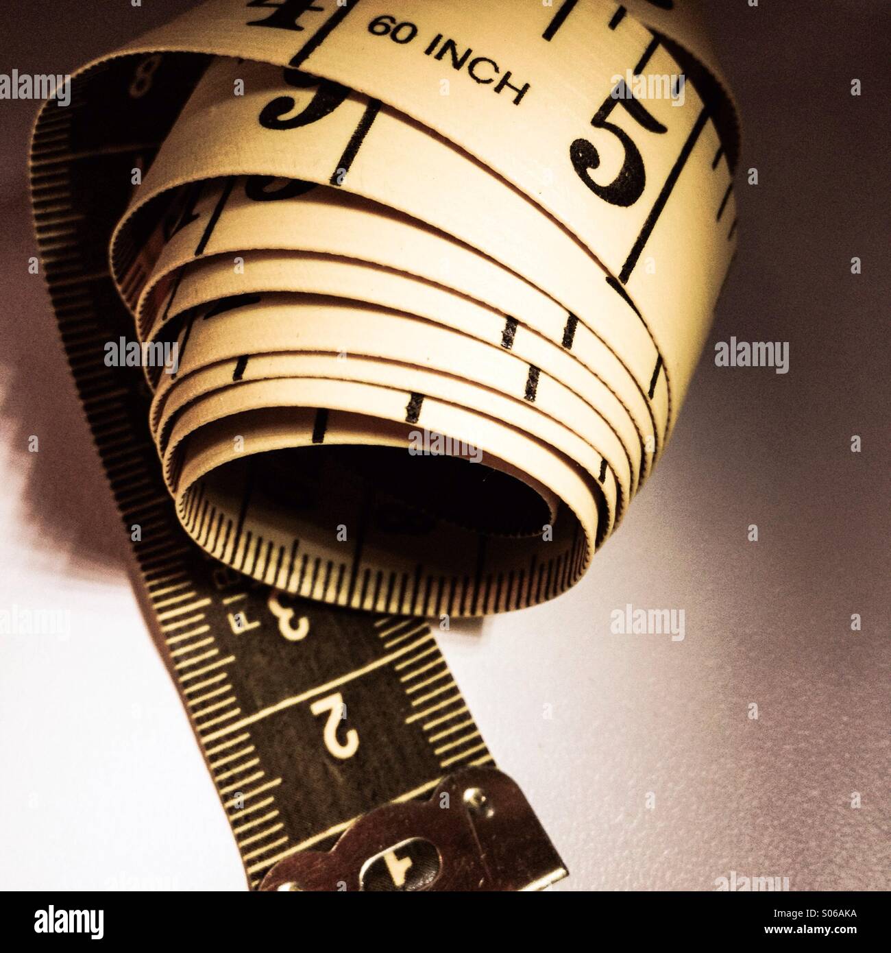 A measuring tape used to determine measurements. - Smartphone Captured Stock Image