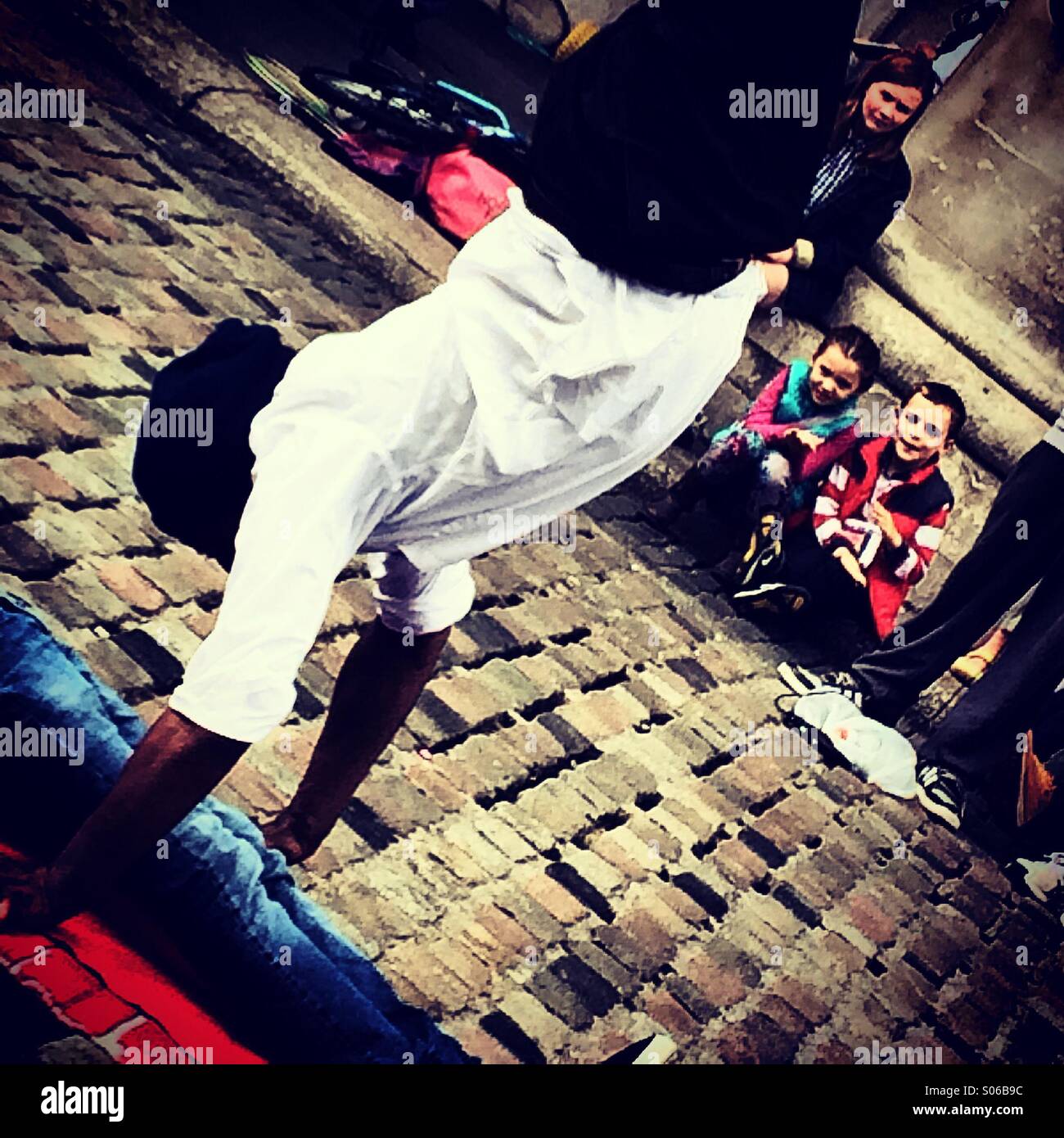 Children watching street performer - Smartphone Captured Stock Image