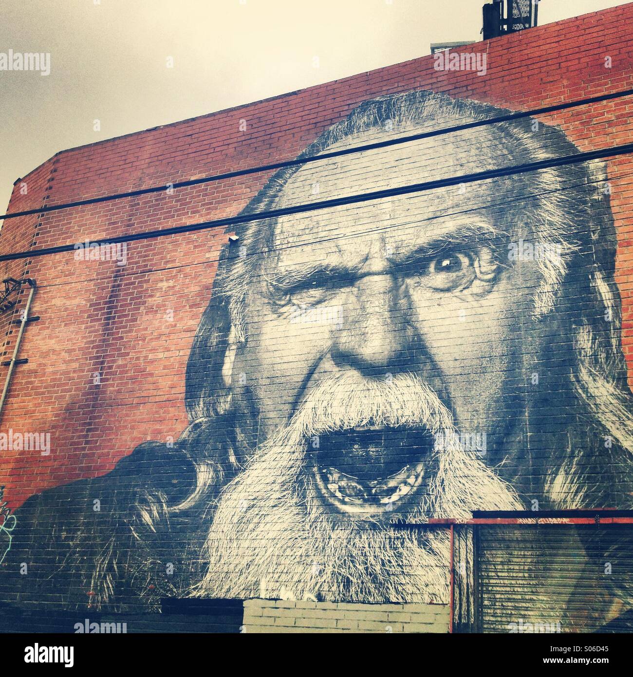 Angry man art on wall Stock Photo