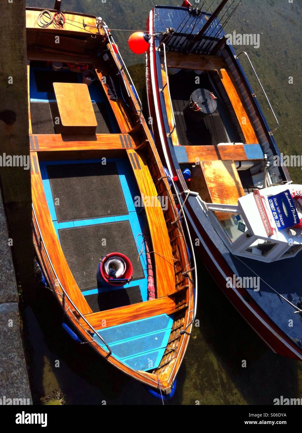 Wooden rowing boats in harbour hi-res stock photography and images - Alamy