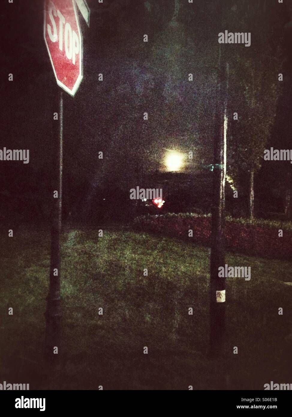 Stop sign in the moonlight. - Smartphone Captured Stock Image