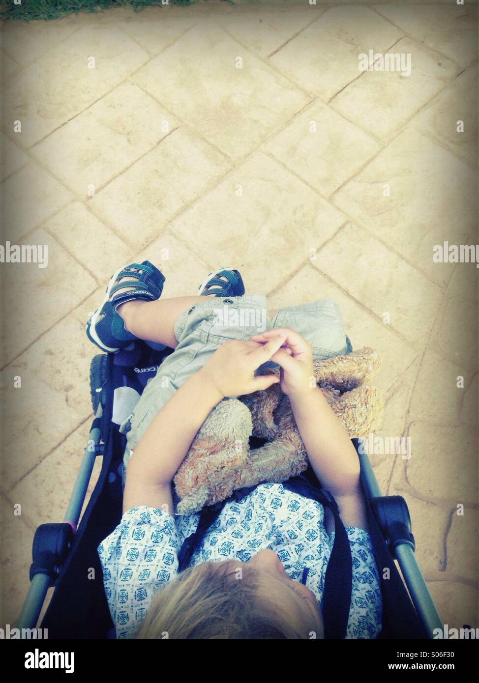 A parents view of child in a pushchair - Smartphone Captured Stock Image