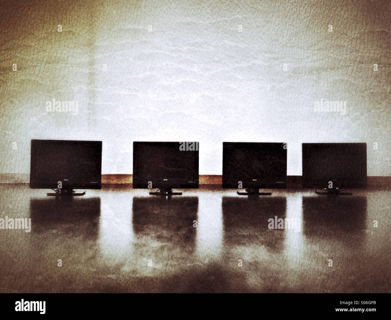 Four monitors. - Smartphone Captured Stock Image