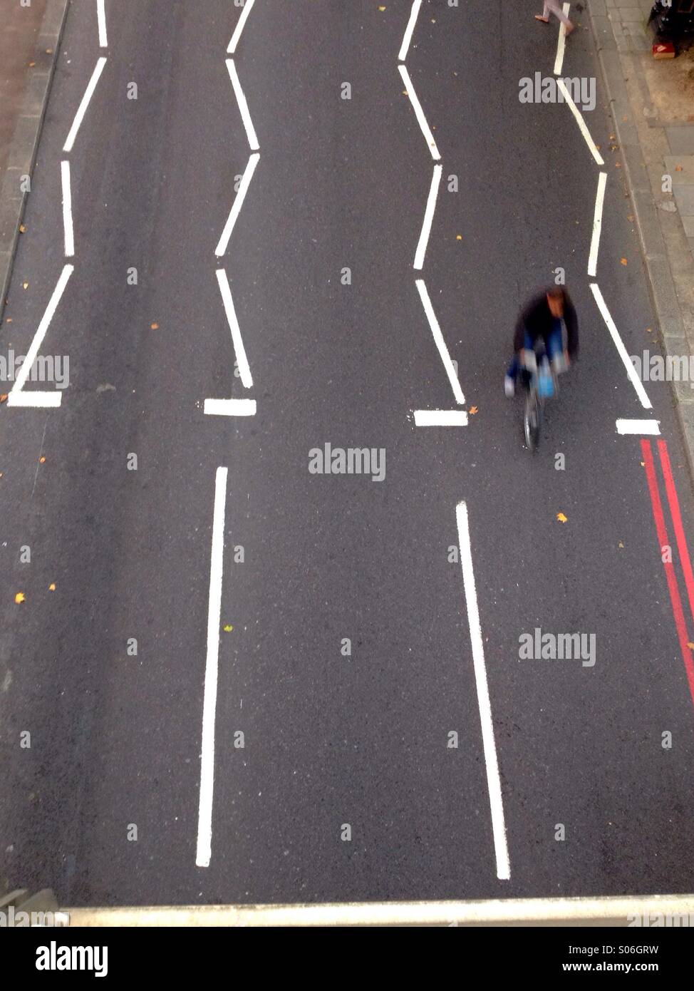 Cyclist photographed from top view near embankment London uk - Smartphone Captured Stock Image