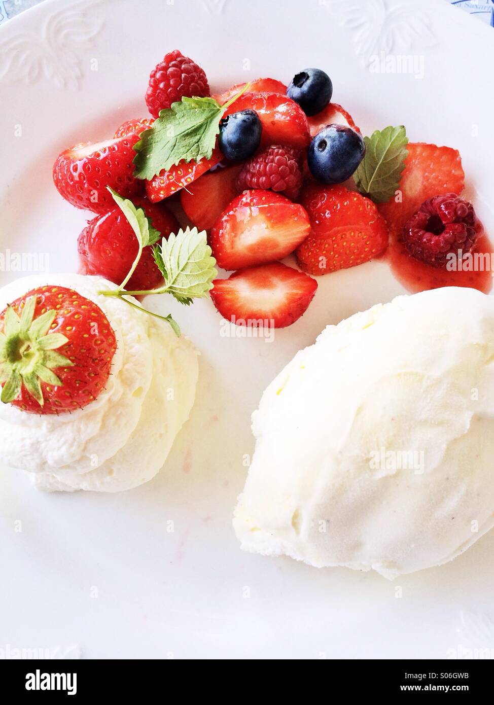 Strawberries with ice cream Stock Photo