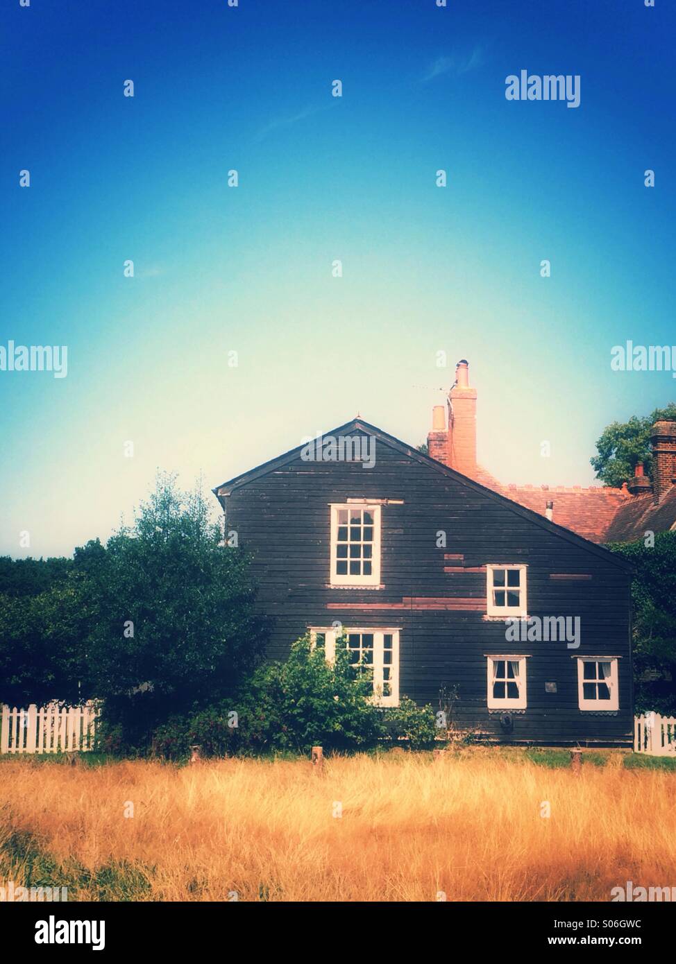 House in a field Stock Photo
