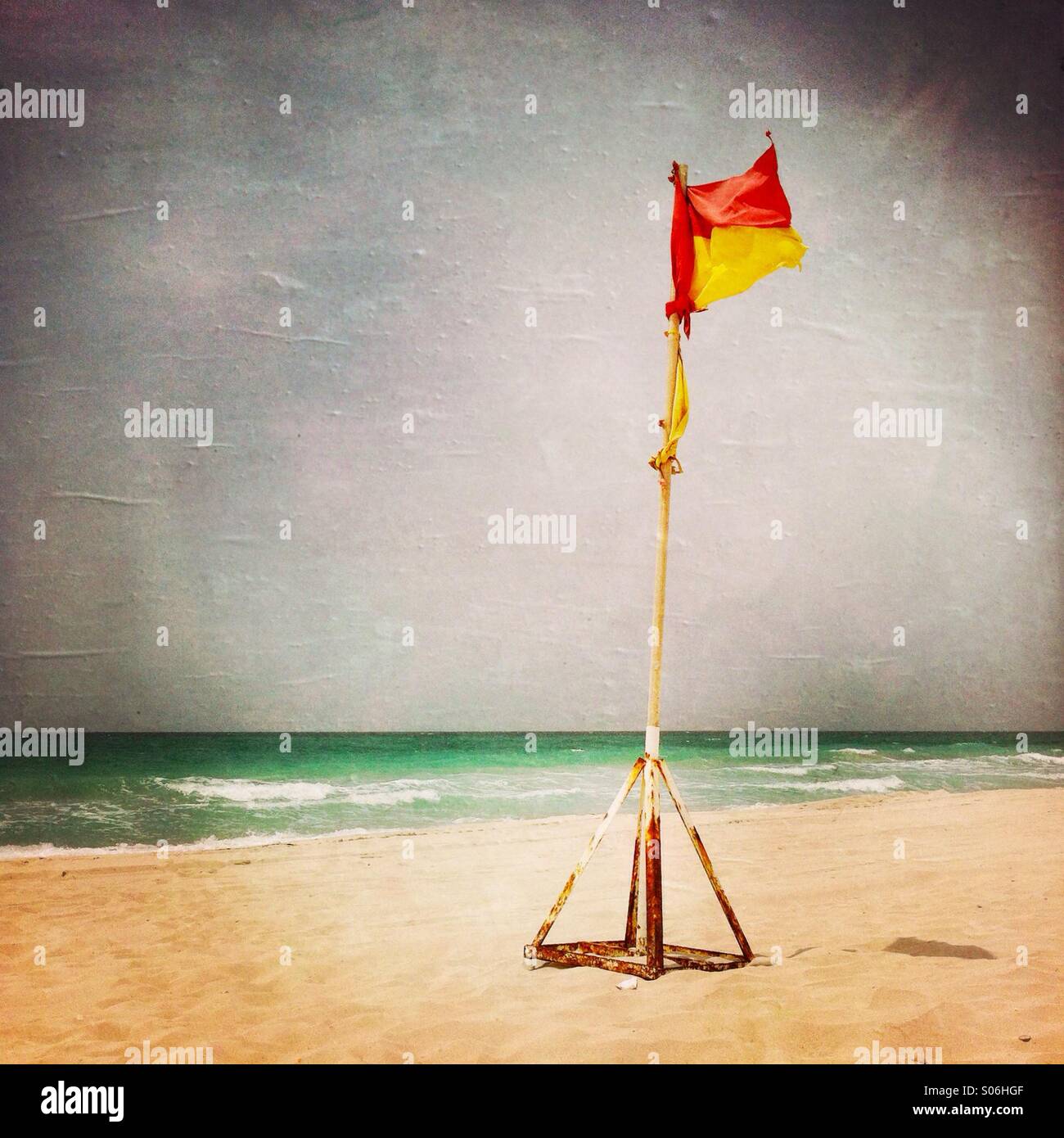 Safety flag on the beach. Abu Dhabi, UAE Stock Photo