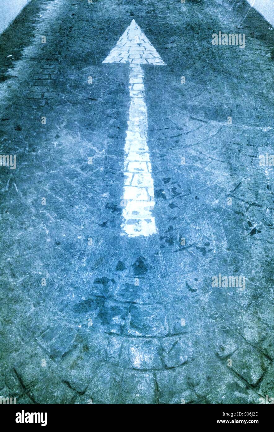 White arrow pointing up - Smartphone Captured Stock Image