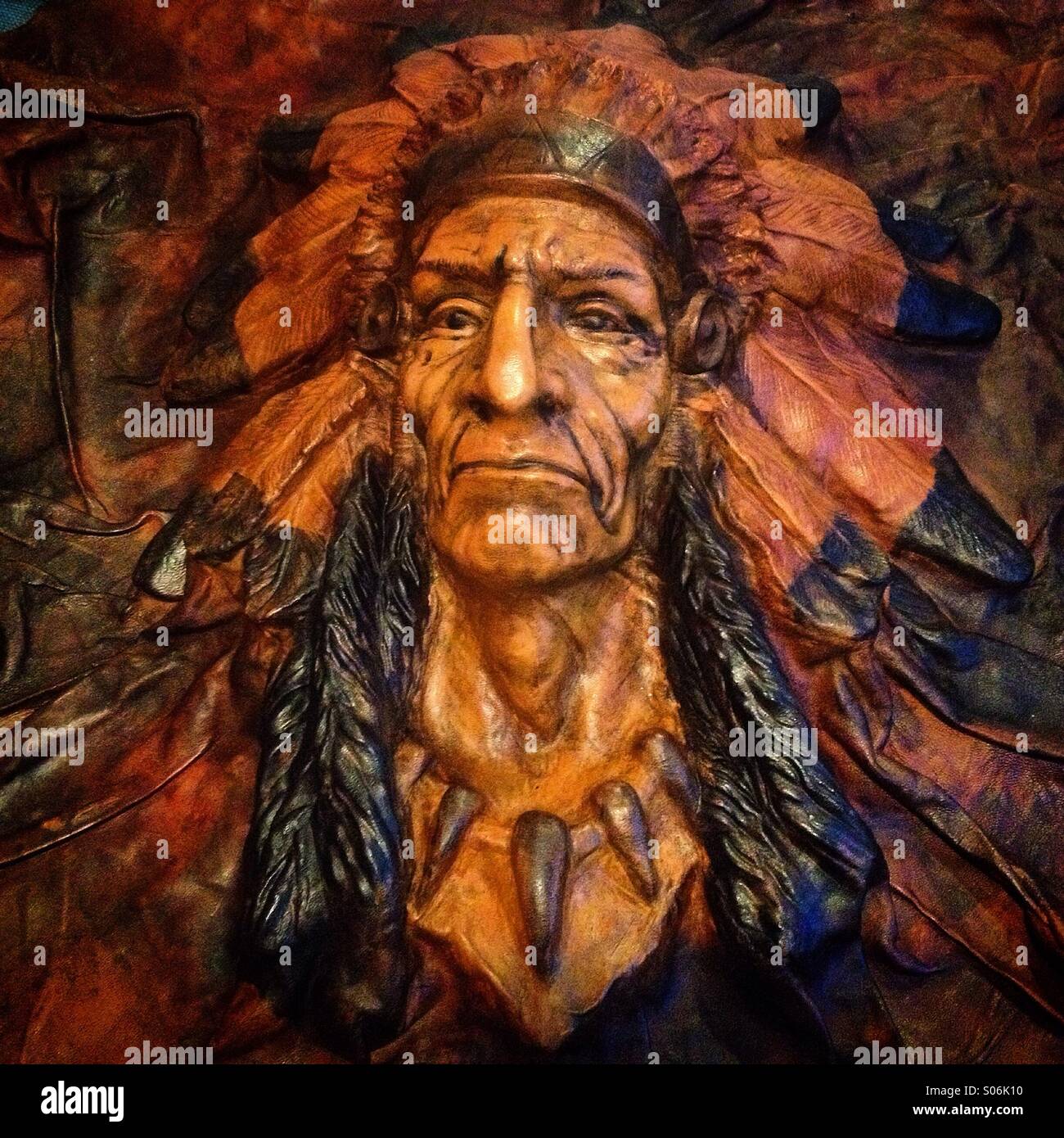 A leather sculpture of an Native American Indian in Mexico City, Mexico - Smartphone Captured Stock Image