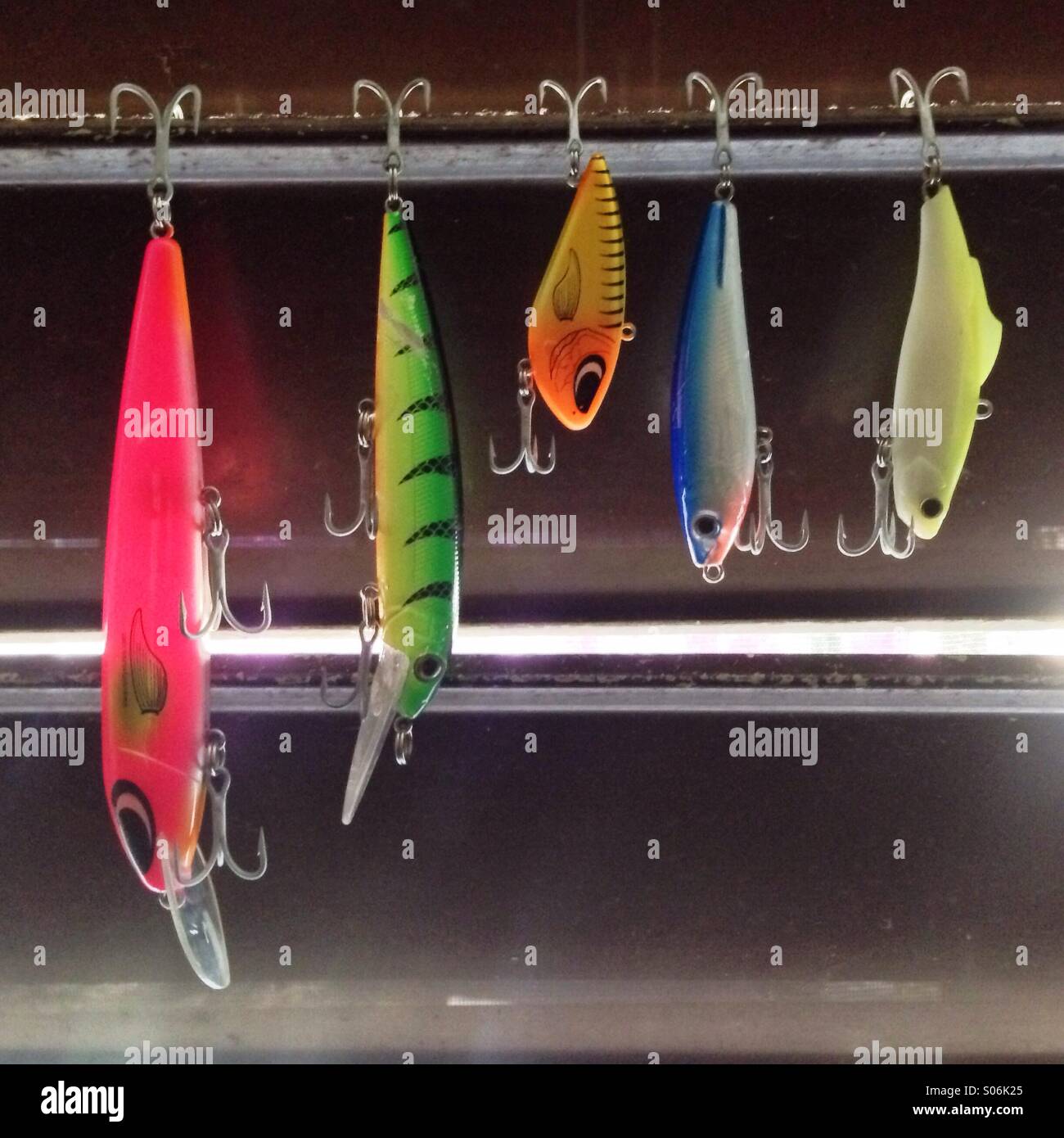 Fishing lures drying after a fishing session. Stock Photo