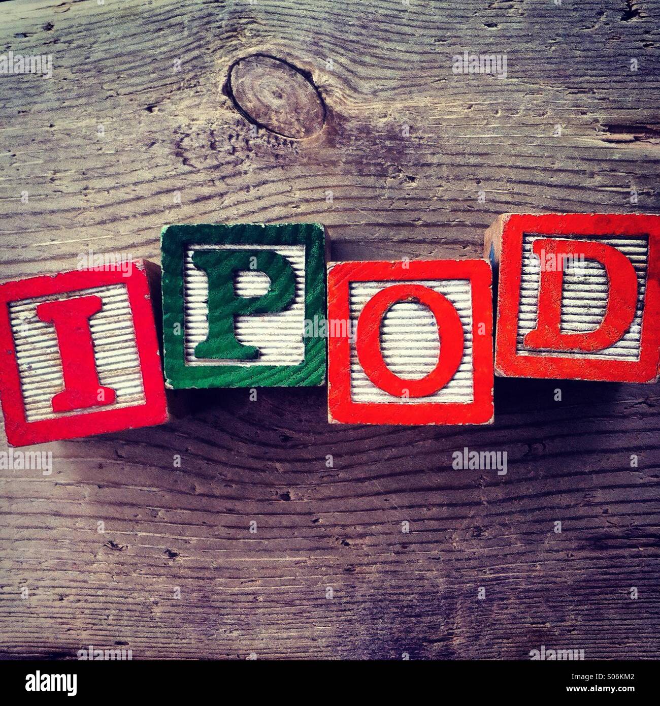 It's a photo of woodblocks toys will alphabet letter on them which are combines together to create the word IPOD Stock Photo