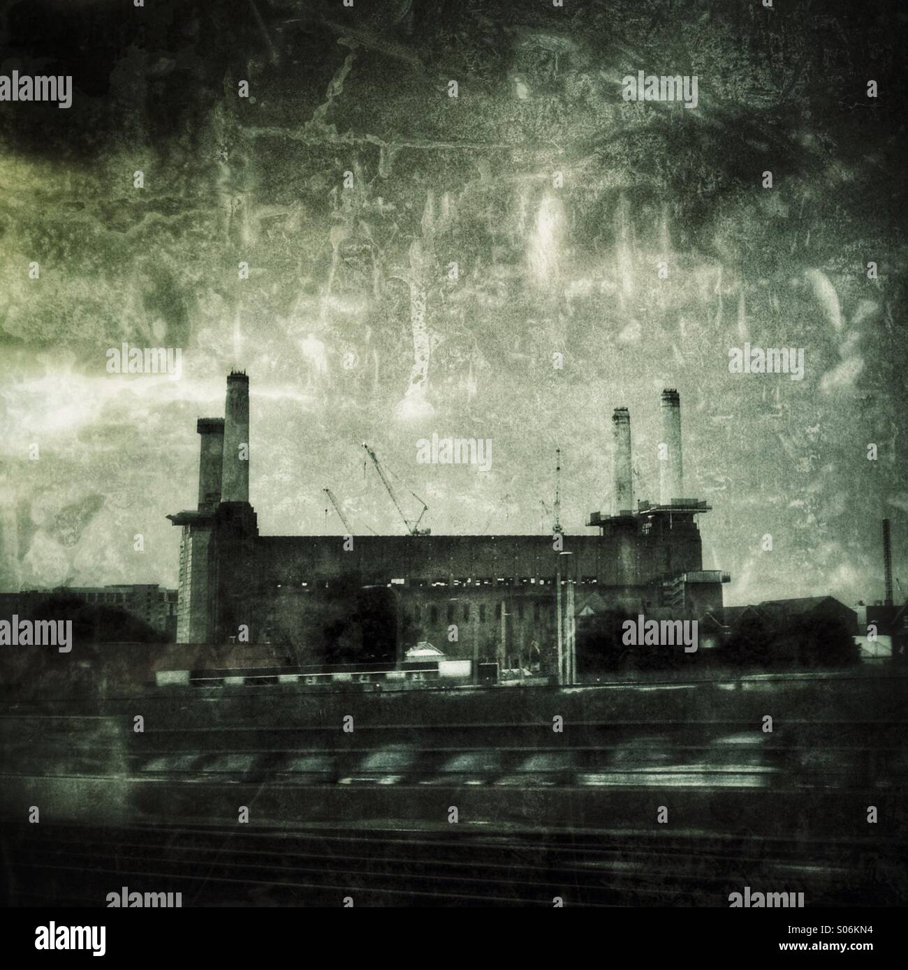 Battersea Power Station as seen from a train, London, England, UK - Smartphone Captured Stock Image