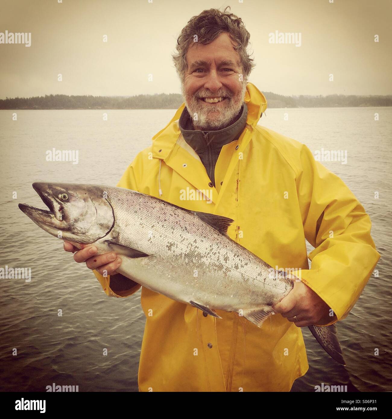 Fisherman with Chinook salmon, Campbell River, Vancouver Island, BC, Canada Stock Photo