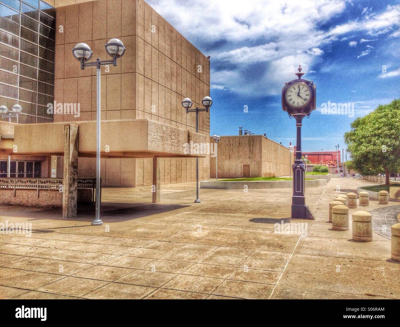 HDR image of Cox building including the street corner clock. Stock Photo