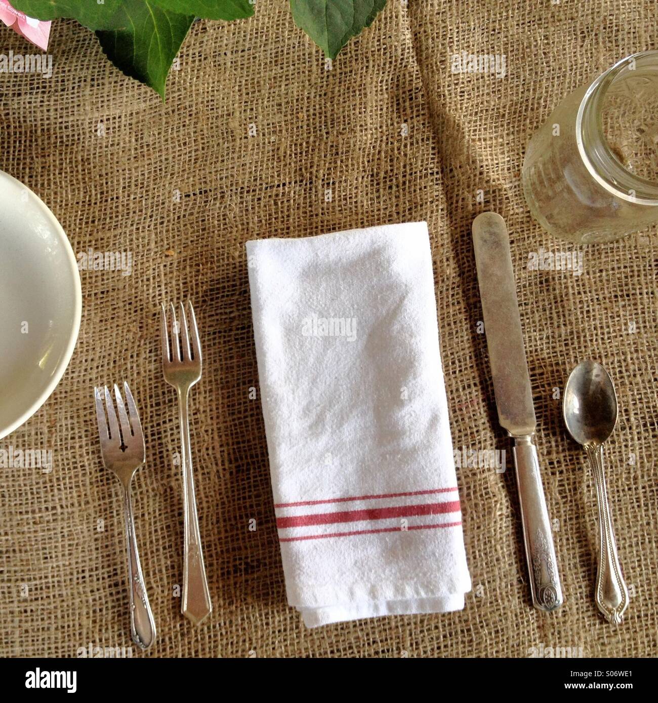 Place setting on burlap - Smartphone Captured Stock Image