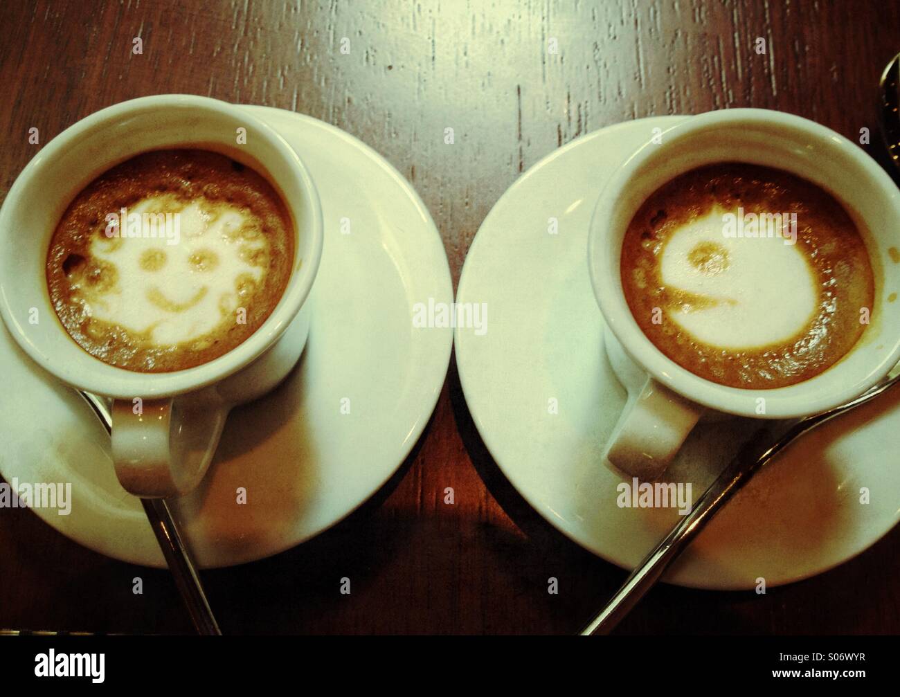 Coffee Art Pac Man and Smiley Stock Photo