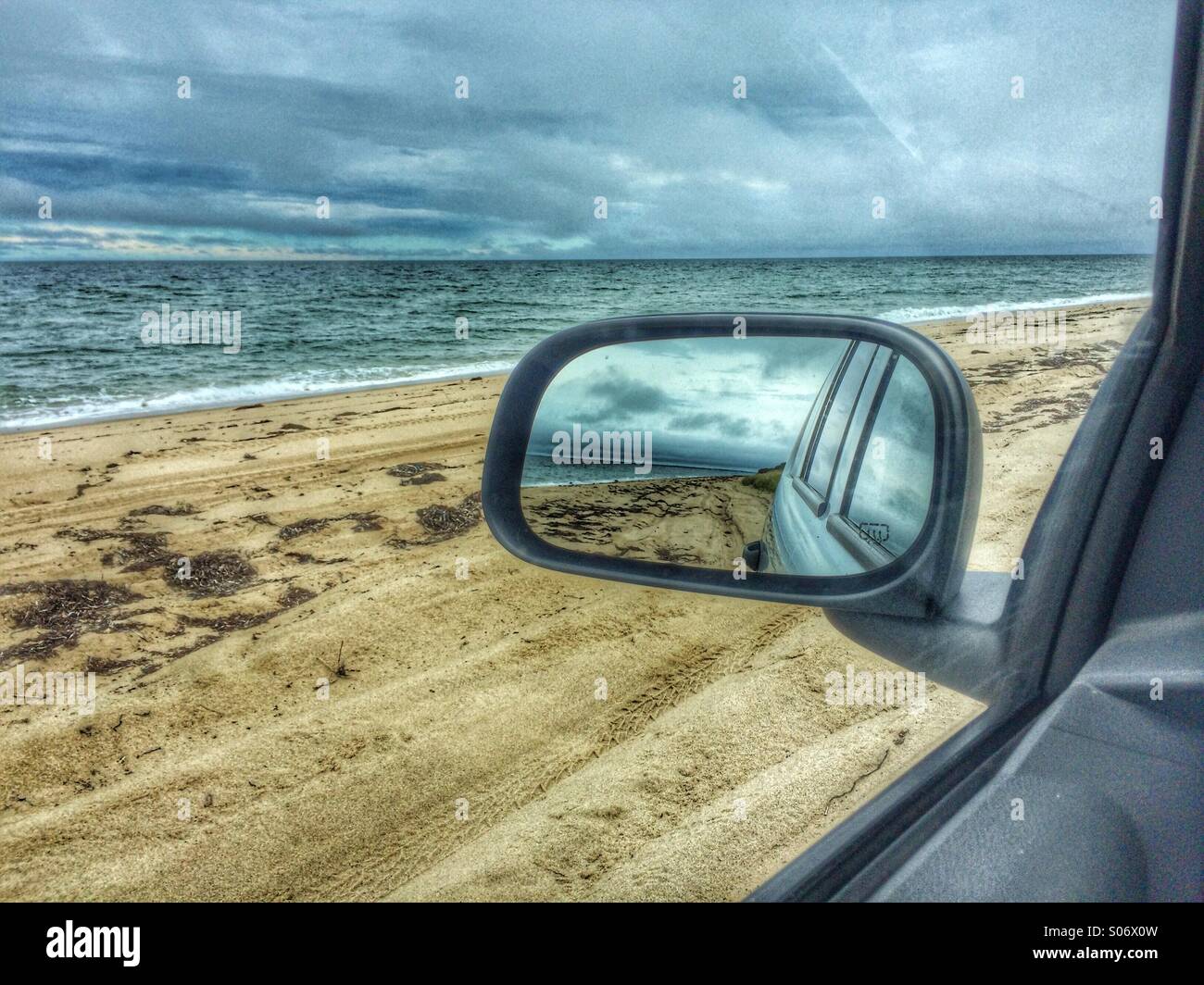 Rear view mirror on beach - Smartphone Captured Stock Image
