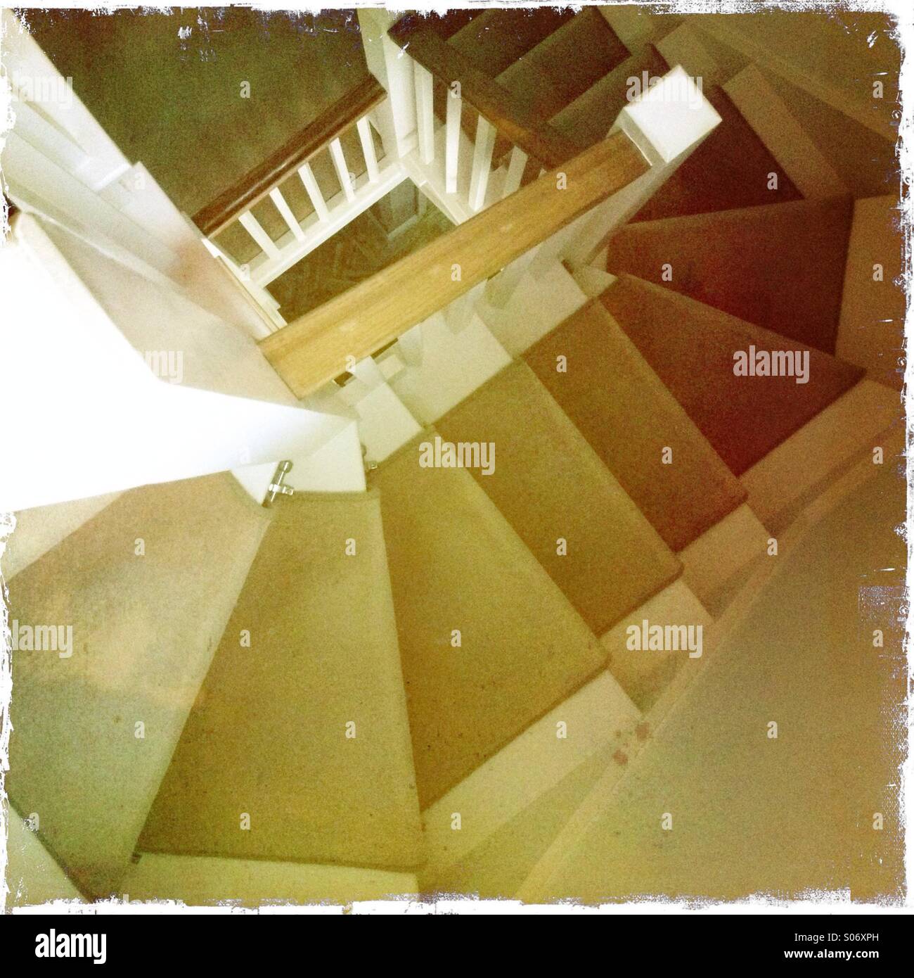 Spiral staircase in domestic interior Stock Photo