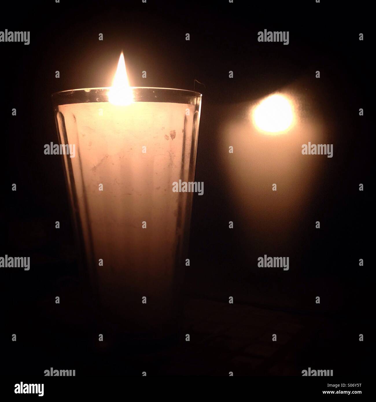 A candle and its reflection in Mexico City Stock Photo Alamy