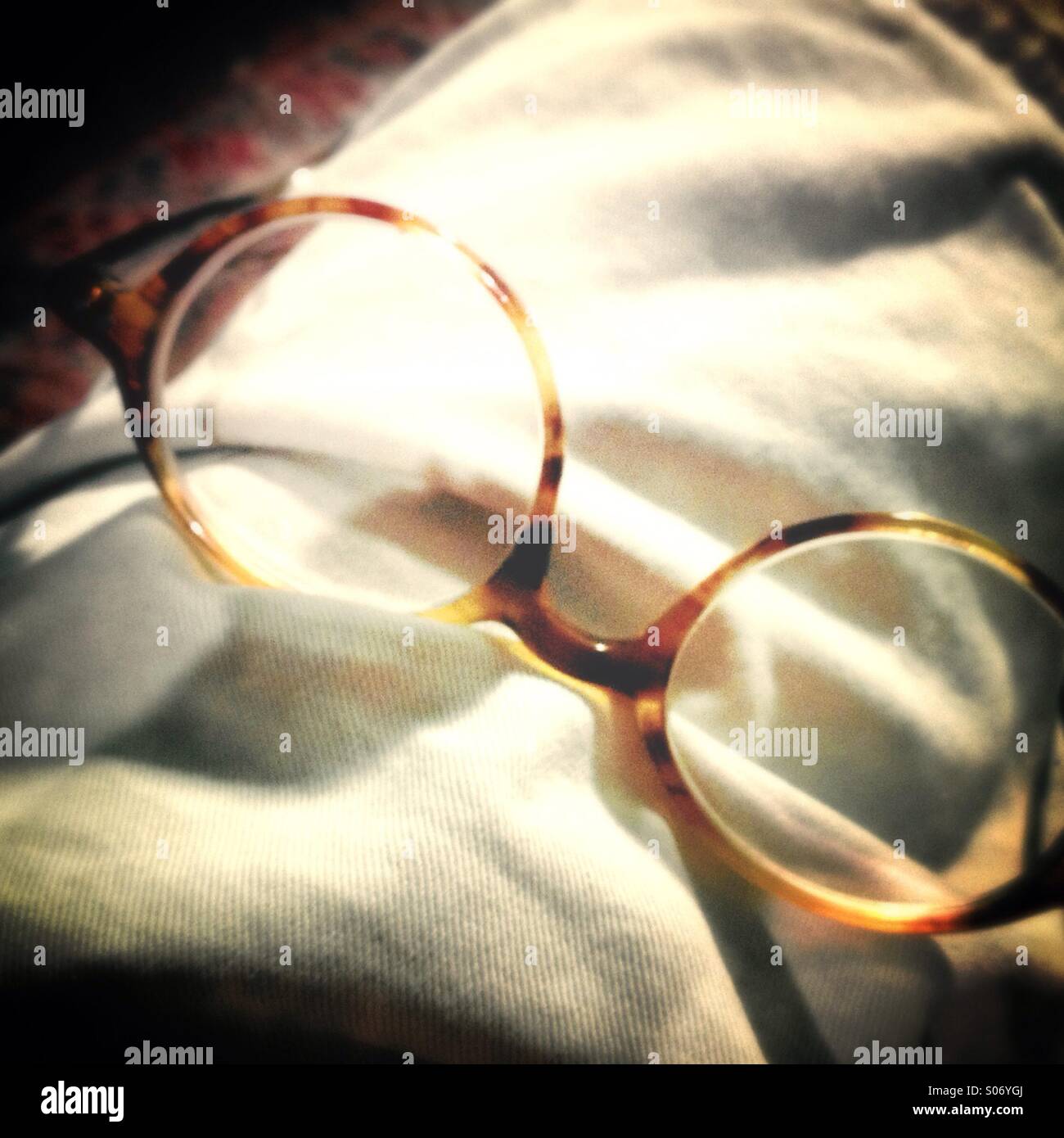 A pair of eye glasses laying upside down Stock Photo Alamy
