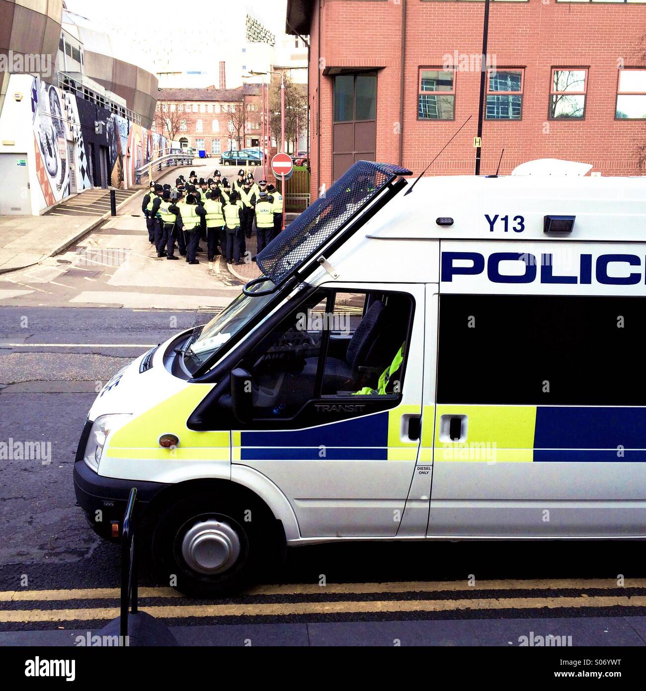 A police van and a group of policemen in Sheffield England UK Stock Photo
