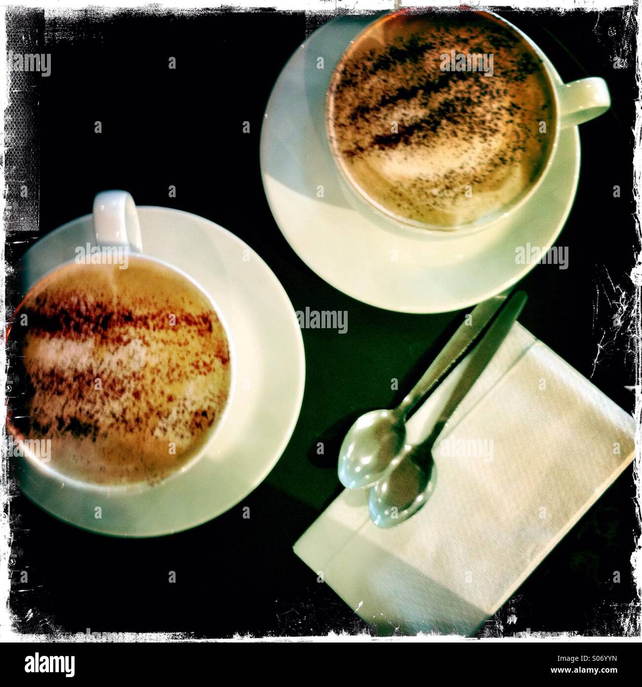 Cappuccino coffees and paper napkin Stock Photo