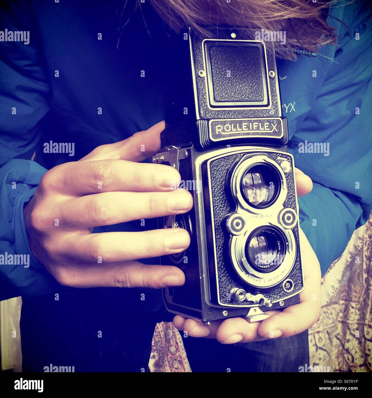 Taking a photograph with a antique camera Stock Photo