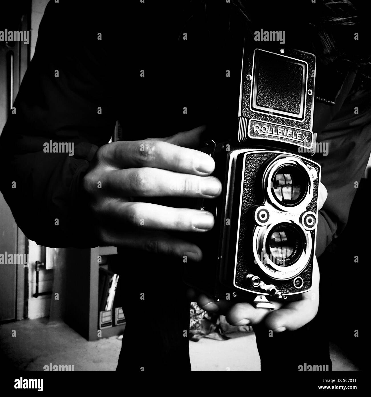 Taking a photograph with a vintage camera Stock Photo