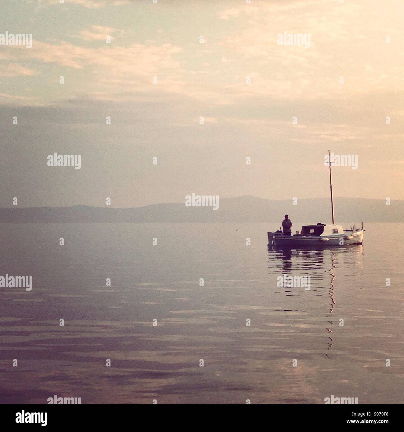 Fisherman and his boat hi-res stock photography and images - Alamy