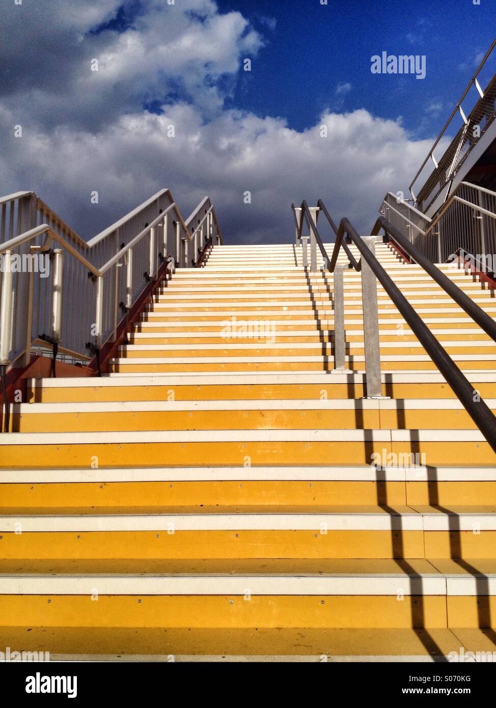 Yellow steps leading up into a blue sky - Smartphone Captured Stock Image Yellow steps leading up into a blue sky - Smartphone Captured Stock Image