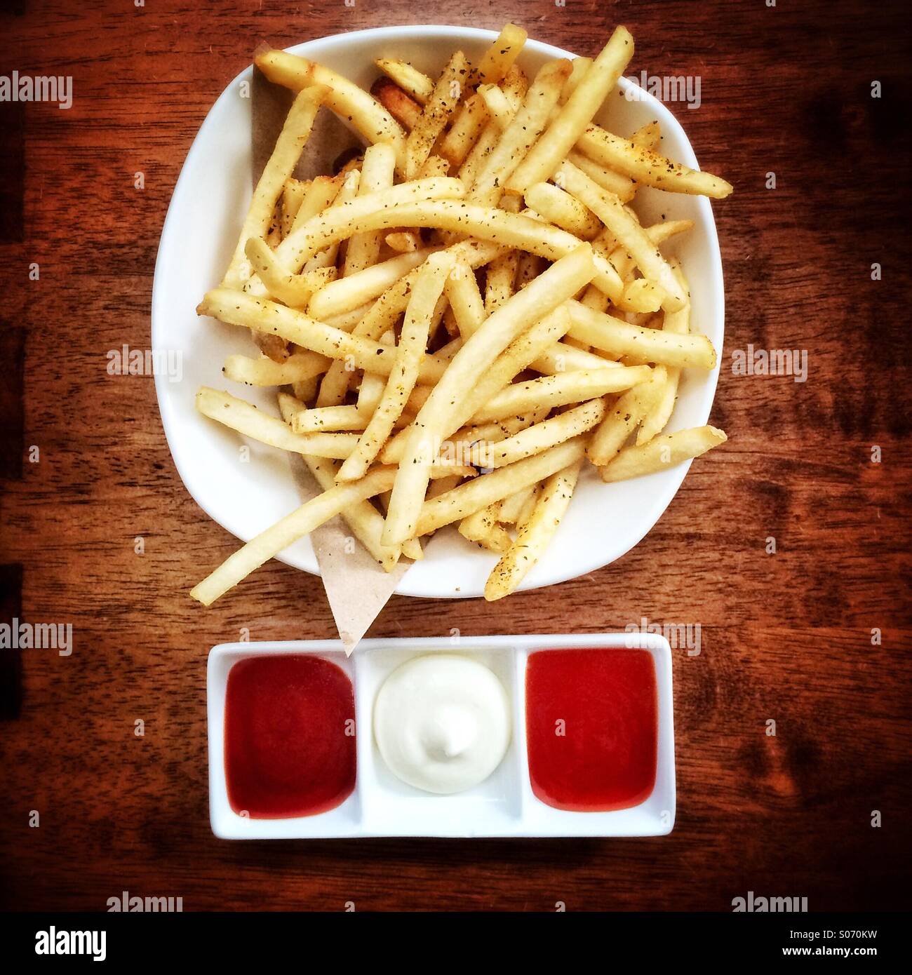 Bowl of chips with dipping sauces Stock Photo Alamy