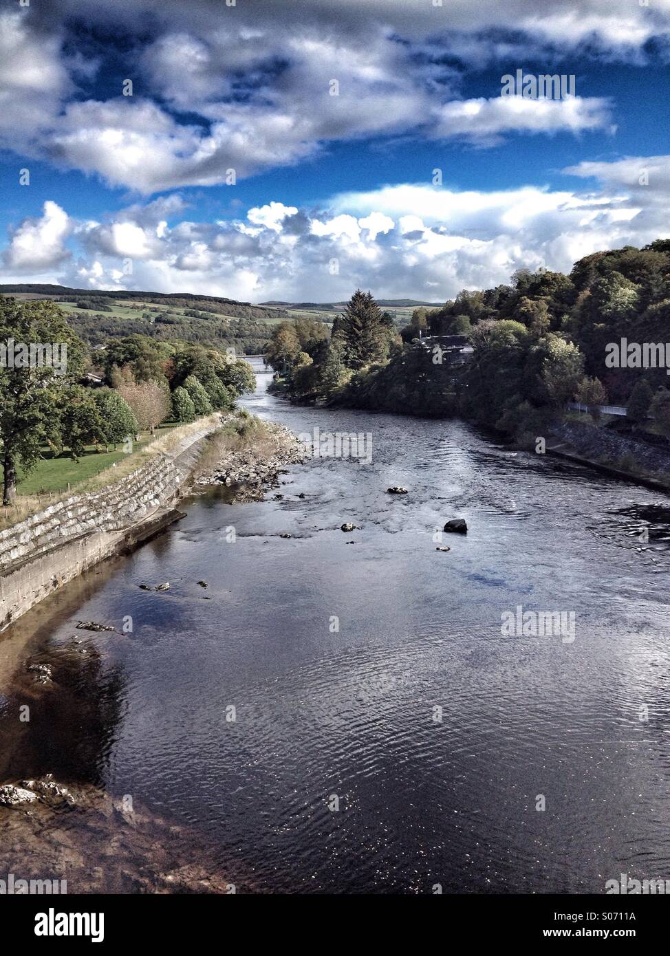 Looking Down the River Tummel from the Pitlochry Hydroelectric Dam. Vertical format. - Smartphone Captured Stock Image