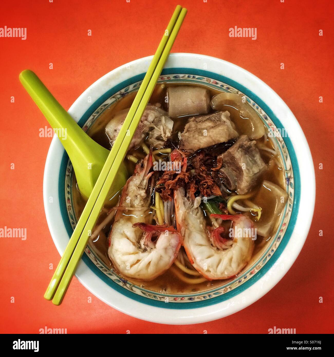 Singapore prawn, pork ribs and tail noodle soup - Smartphone Captured Stock Image