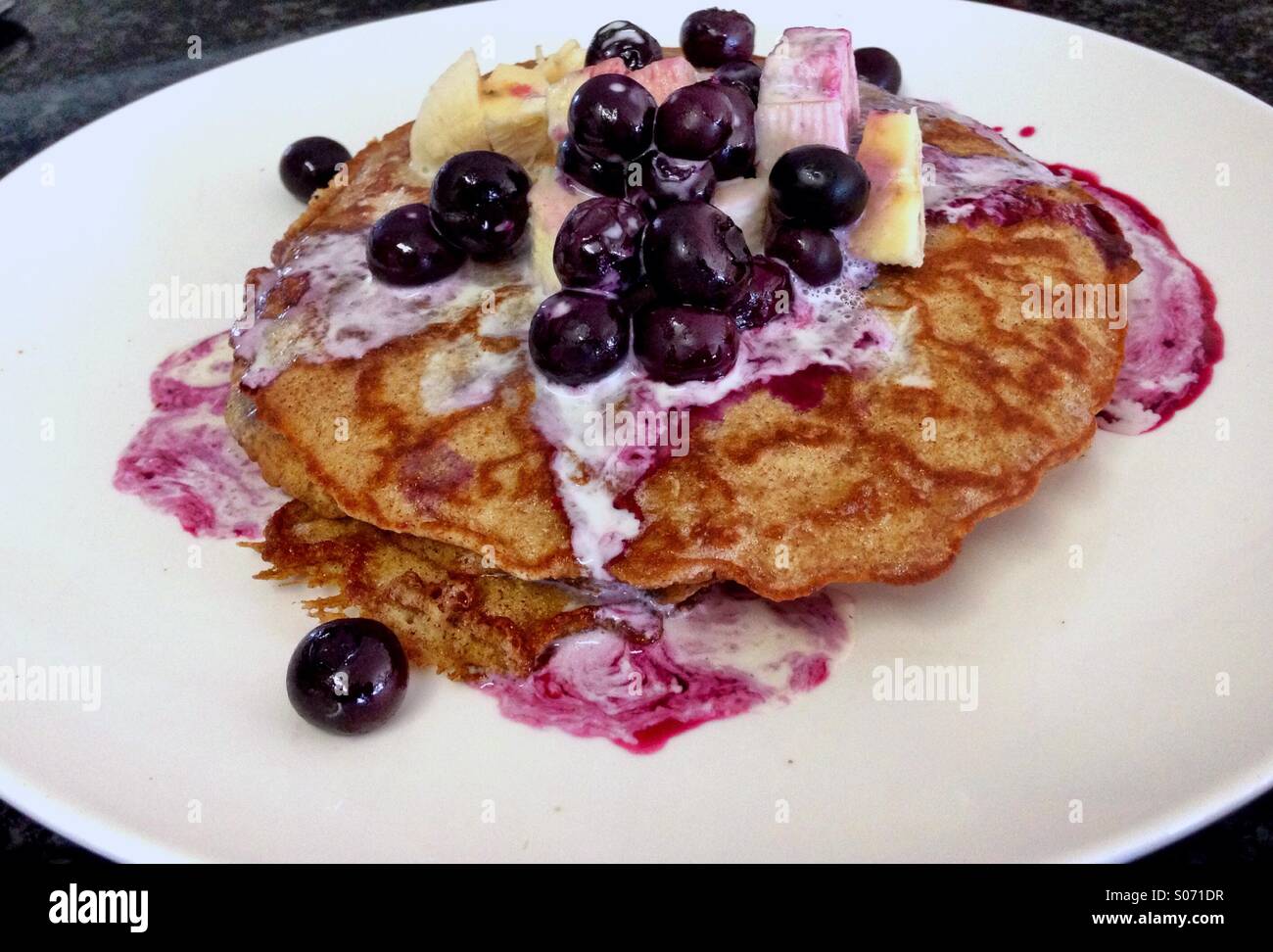 Pancakes,Bananas and Blueberries. Healthy option, made from brown rice. - Smartphone Captured Stock Image Pancakes,Bananas and Blueberries. Healthy option, made from brown rice. - Smartphone Captured Stock Image