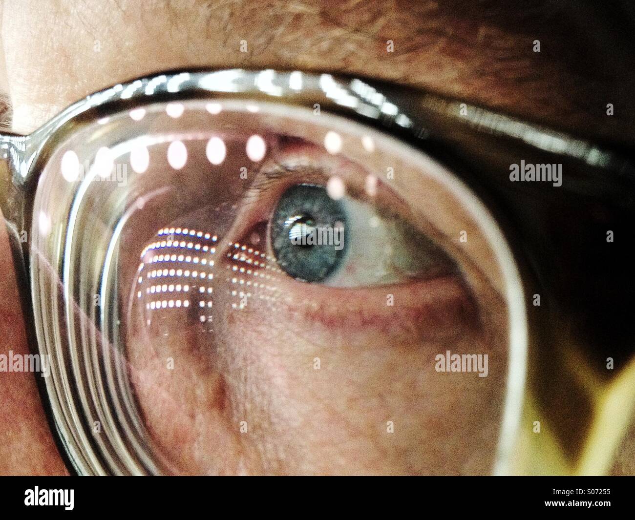 Man with glasses and reflections - Smartphone Captured Stock Image