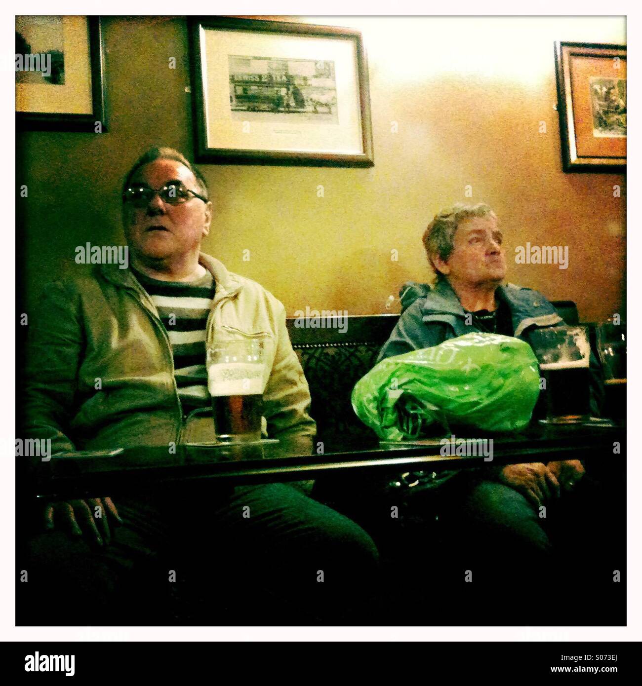 Two people in a pub in Sheffield England Stock Photo