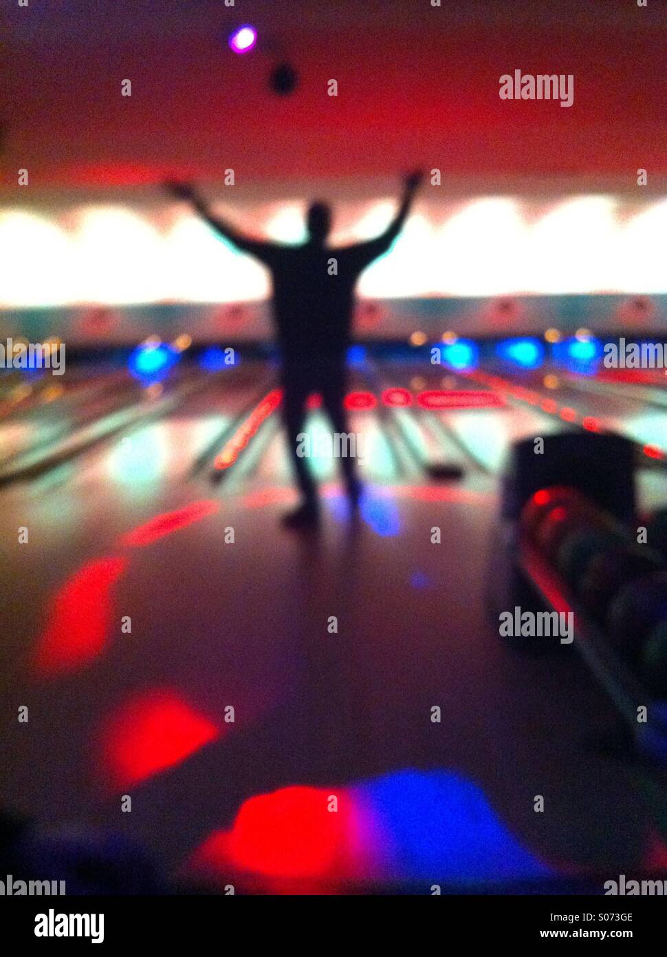 Bowling a strike hi-res stock photography and images - Alamy