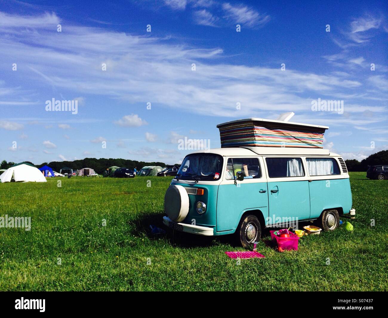 VW campervan in a camping field Stock Photo Alamy