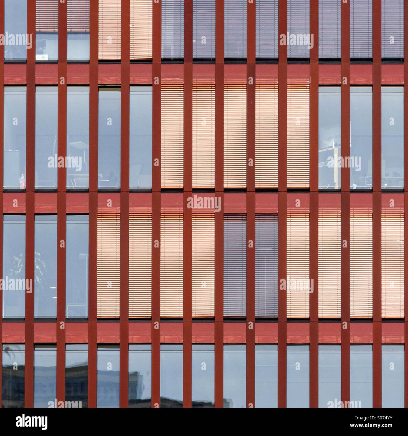 Rust red office building facade. - Smartphone Captured Stock Image