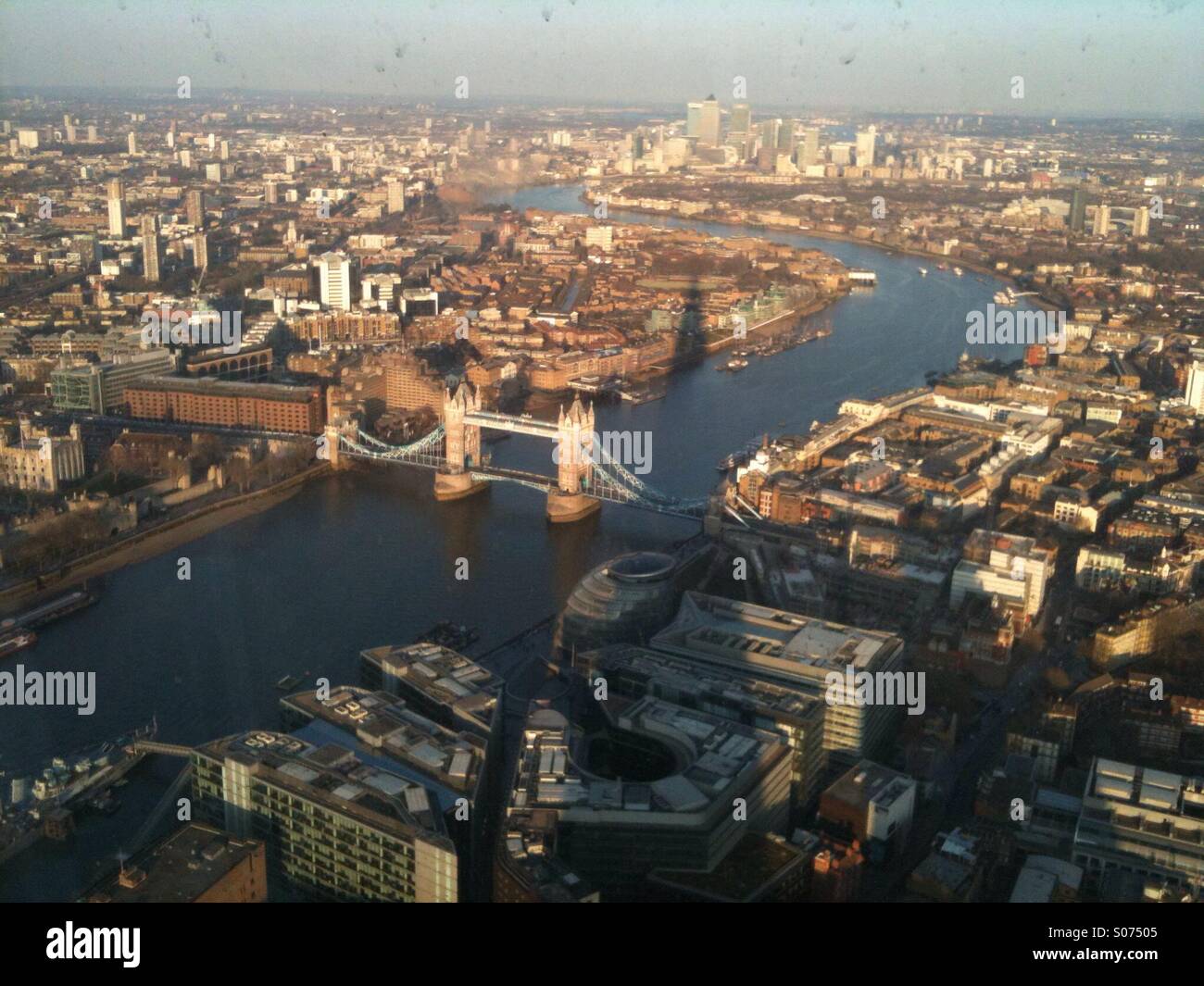 Aerial view of London with Tower Bridge and shadow of the Shard on a sunny day 2013 - Smartphone Captured Stock Image