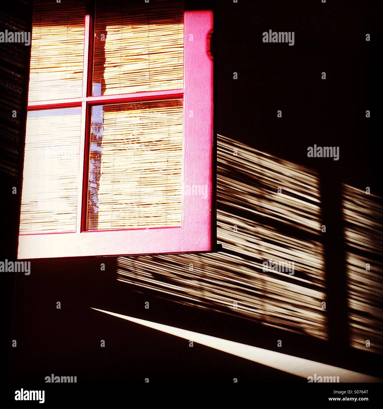 Window at the beach house warmed on a sunny afternoon - Smartphone Captured Stock Image