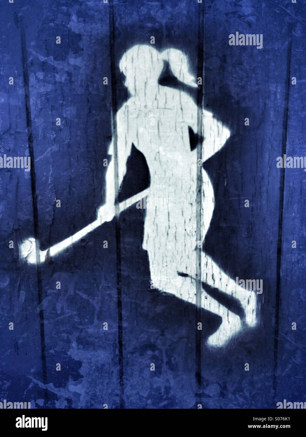 Silhouette of girl playing Field Hockey - Smartphone Captured Stock Image