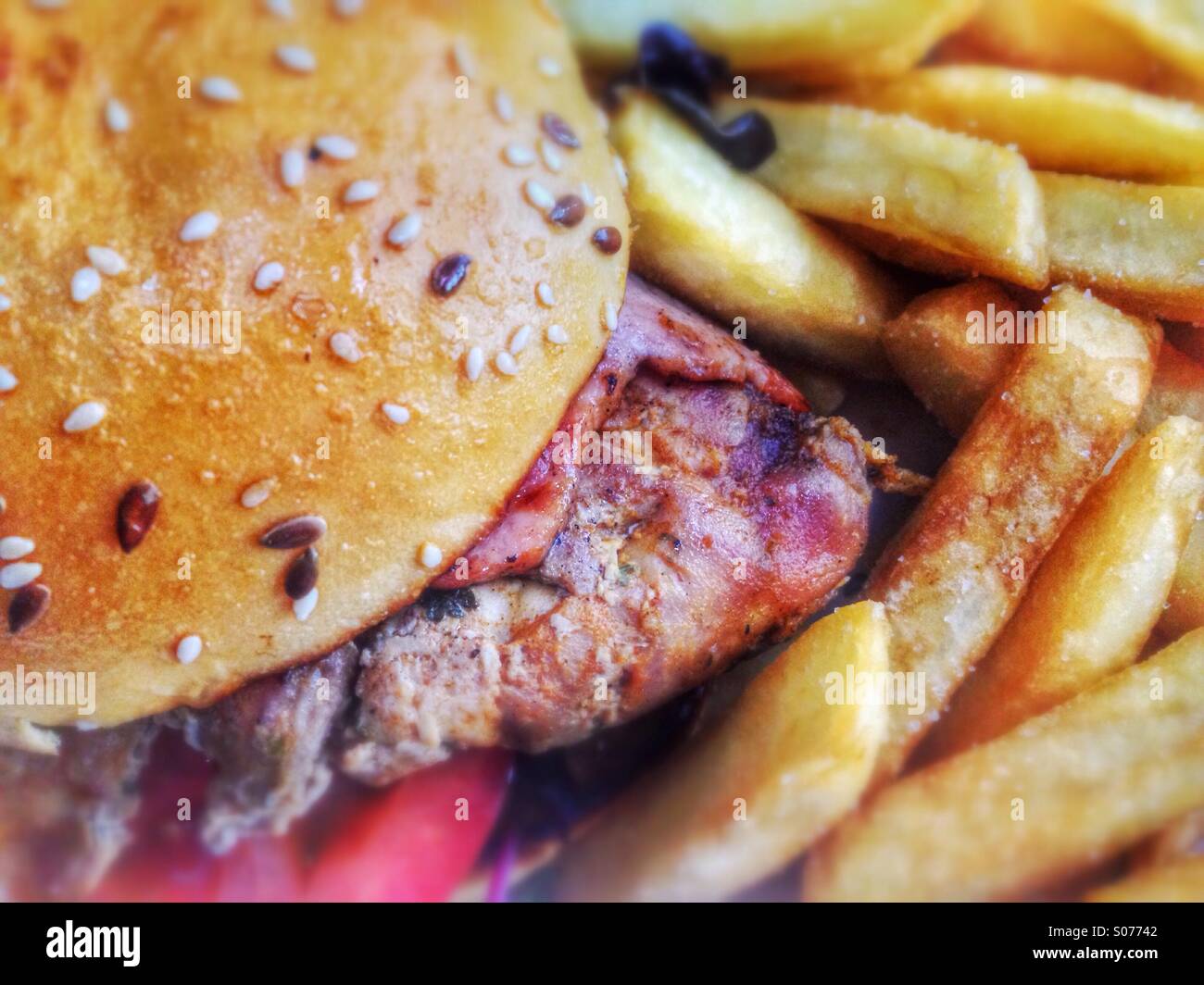 Chicken burger with French fries. - Smartphone Captured Stock Image