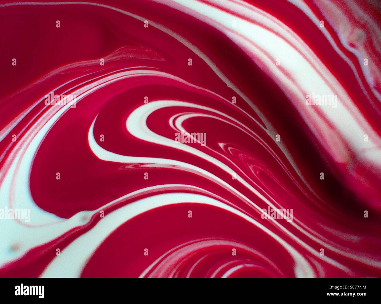 Paint mixing together Stock Photo - Alamy