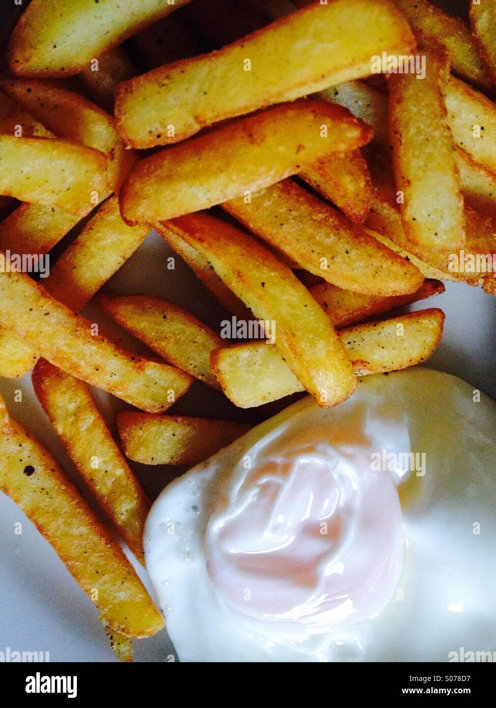 Egg and chips on a plate - Smartphone Captured Stock Image