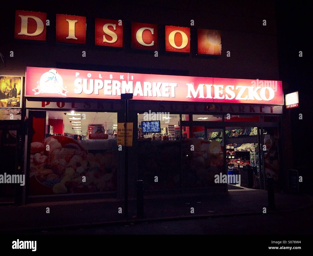 Exterior of Polish supermarket at night, London, UK Stock Photo