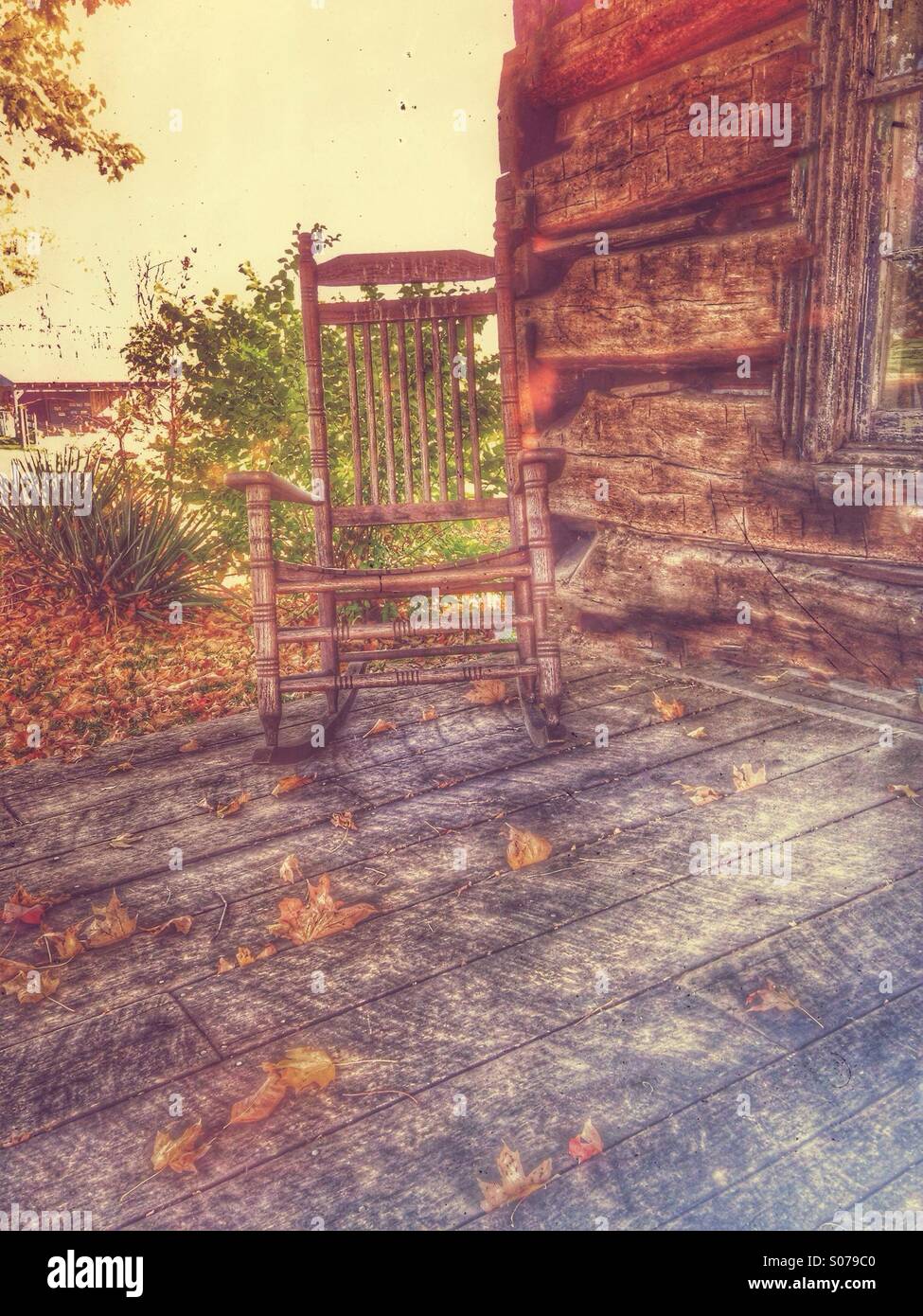 A relaxing rocking chair at the old homestead. - Smartphone Captured Stock Image