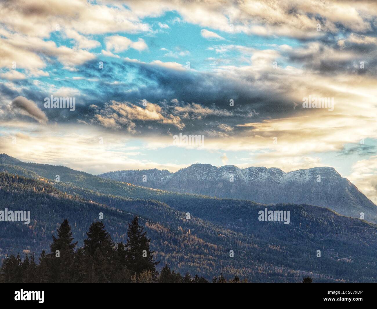 Afternoon sun after first snowfall in hills around Salmon Arm - Smartphone Captured Stock Image