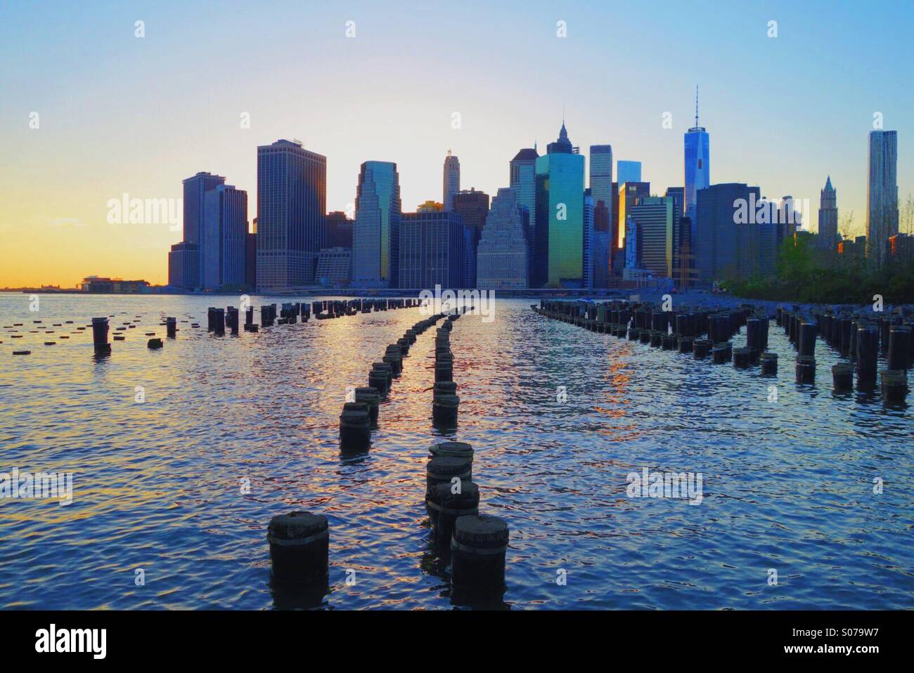 Watching the Manhattan skyline turn into night. Stock Photo