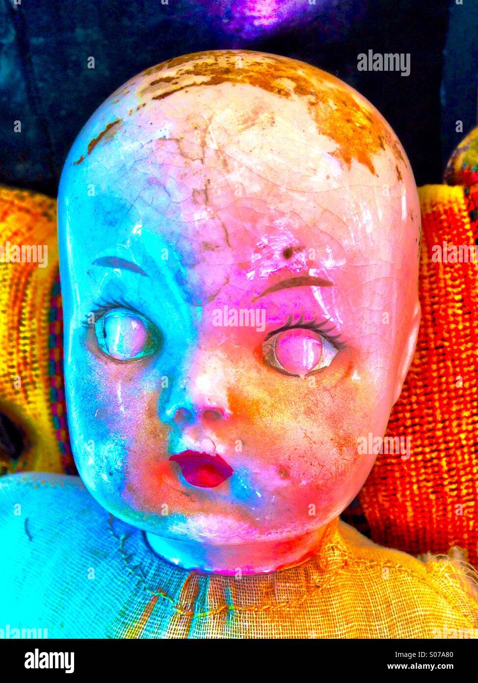 Vintage doll head with colors Stock Photo